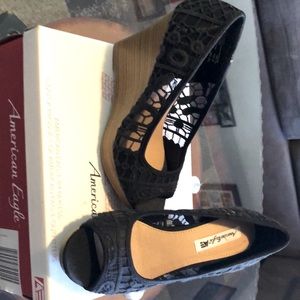 Brand new black lace wedges, American Eagle. 15$